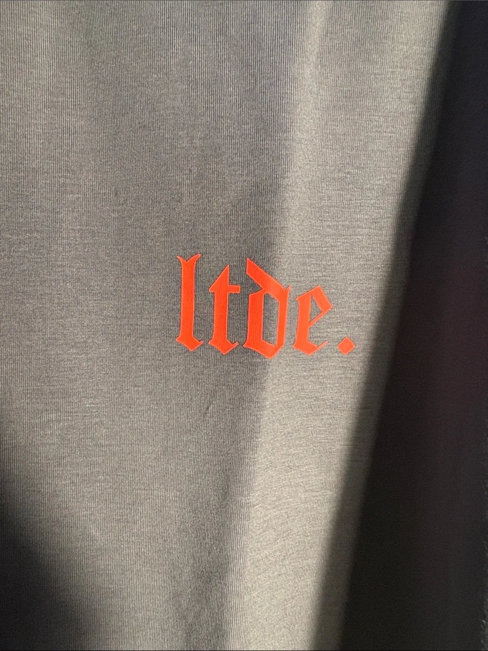 tde. Men's Charcoal Short Sleeve Crewneck T-Shirt with Red Logo